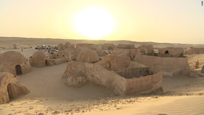 George Lucas filmed parts of his "Star Wars" films in the Tunisian Sahara Desert. The set is slowly being engulfed by a moving sand dune. Photo courtesy: CNN.