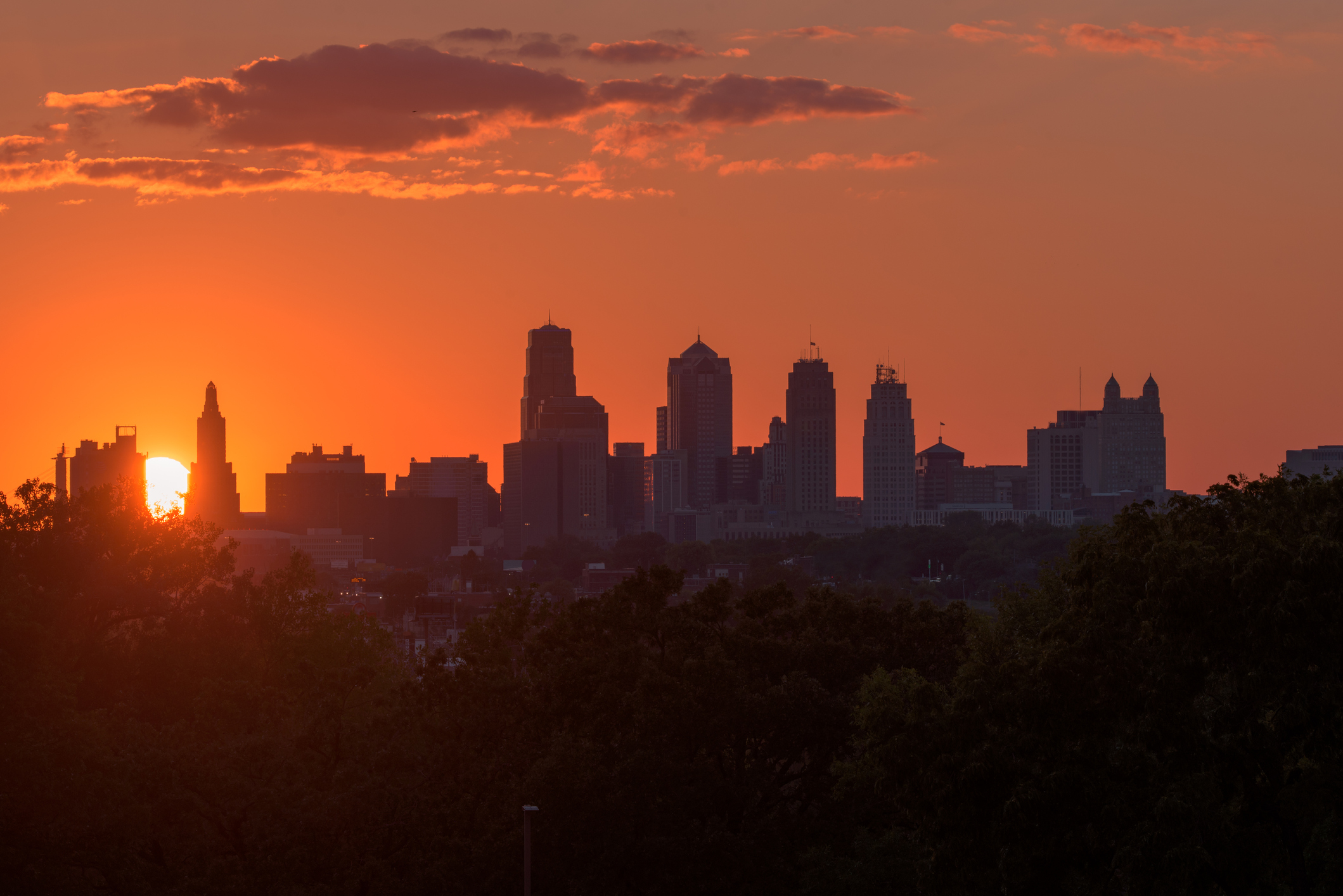 Picture of a sunset over the Kansas City skyline